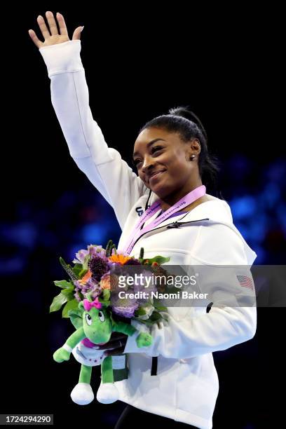 Simone Biles of Team United States celebrates winning gold on the Beam on Day Nine of the 2023 Artistic Gymnastics World Championships at Antwerp...