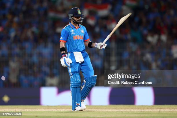 Virat Kohli of India celebrates reaching a half century during the ICC Men's Cricket World Cup India 2023 between India and Australia at MA...