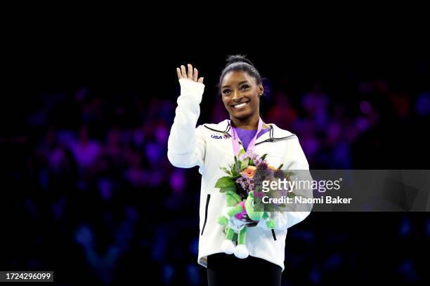 Simone Biles of Team United States celebrates winning gold on the Beam on Day Nine of the 2023 Artistic Gymnastics World Championships at Antwerp...