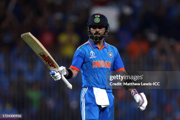 Virat Kohli of India celebrates reaching a half century during the ICC Men's Cricket World Cup India 2023 between India and Australia at MA...