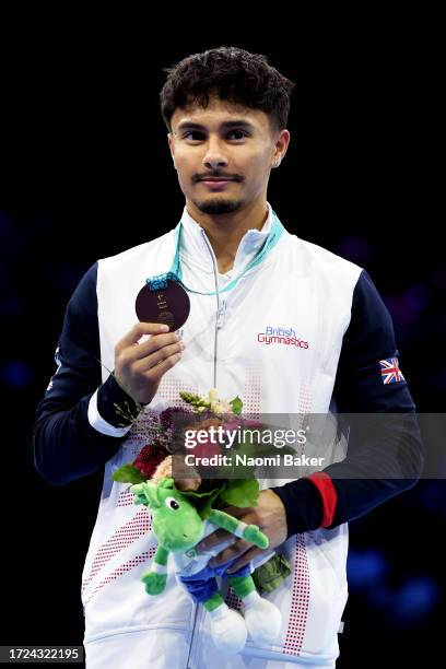 Jake Jarman of Team Great Britain poses for a photo with his gold medal on Vault in the Men's Apparatus Finals on Day Nine of the 2023 Artistic...