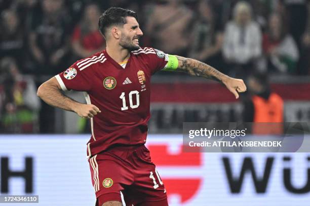 Hungary's forward Dominik Szoboszlai celebrates at the final whistle of the UEFA Euro 2024 Group G qualification football match Hungary v Serbia at...