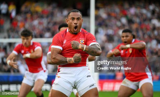 In this handout image provided by World Rugby, Sonatane Takulua of Tonga leads the Sipi Tau prior to kick-off ahead of the Rugby World Cup France...