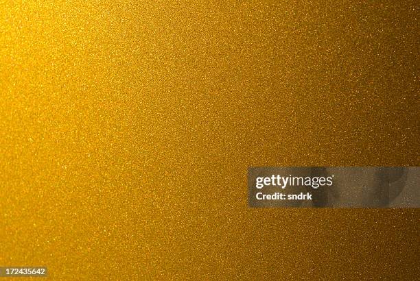 gold farbe hintergrund - biegung stock-fotos und bilder