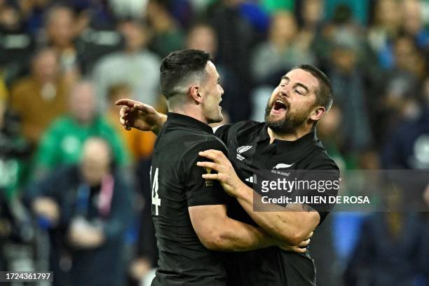 New Zealand's right wing Will Jordan and New Zealand's hooker Dane Coles celebrate after they won the France 2023 Rugby World Cup quarter-final match...