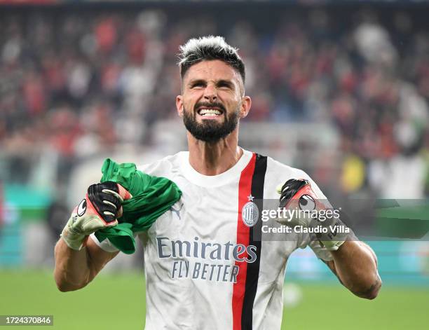 Olivier Giroud of AC Milan celebrates at the end of the Serie A TIM match between Genoa CFC and AC Milan at Stadio Luigi Ferraris on October 07, 2023...