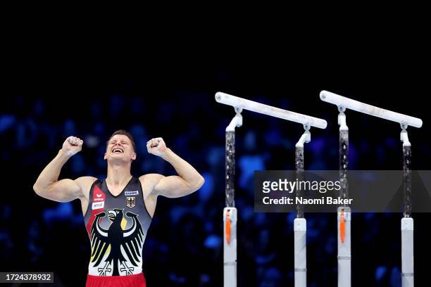 Lukas Dauser of Team Germany celebrates after competing on Parallel Bars during the Men's Apparatus Finals on Day Nine of the 2023 Artistic...