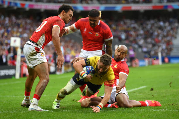 Florin Surugiu of Romania scores his team's second try during the Rugby World Cup France 2023 match between Tonga and Romania at Stade Pierre Mauroy...