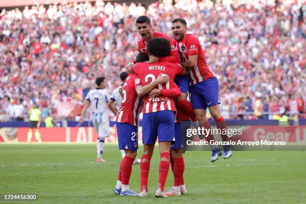 Antoine Griezmann of Atletico de Madrid celebrates scoring their second goal with teammates Javi Galan , Alvaro Morata , Rodrigo Riquelme and of...
