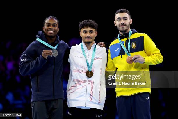 Silver Medalist, Khoi Young of Team United States, Gold Medalist, Jake Jarman of Team Great Britain and Bronze Medalist, Nazar Chepurnyi of Team...