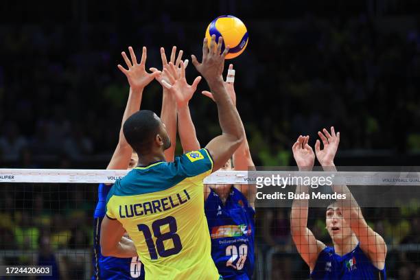 Lucarelli of Brazil jumps to spike the ball during the men's Olympic qualifying tournament 2023 volleyball match between Brazil and Italy at...