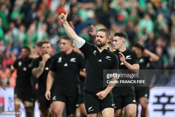 New Zealand's hooker Dane Coles celebrates after winning the France 2023 Rugby World Cup quarter-final match between Ireland and New Zealand at the...