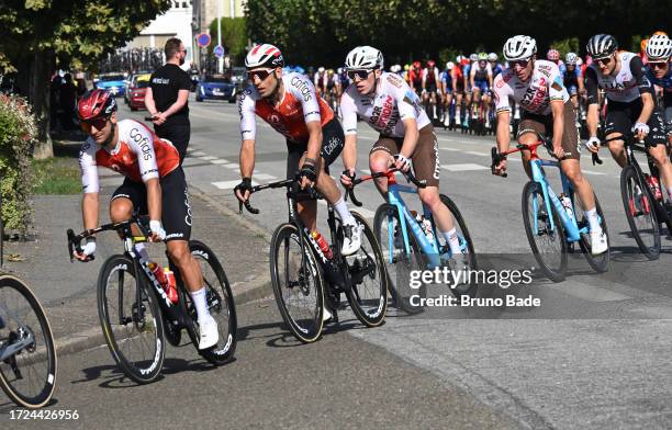 Bryan Coquard of France, Davide Cimolai of Italy and Team Cofidis and Stan Dewulf of Belgium and AG2R Citroën Team compete during the 117th Paris -...