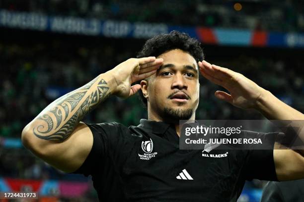 New Zealand's left wing Leicester Fainga'anuku reacts after New Zealand won the France 2023 Rugby World Cup quarter-final match between Ireland and...