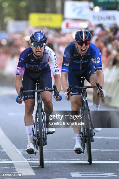 A Race winner Riley Sheehan of The United States and Team Israel - Premier Tech and Lewis Askey of The United Kingdom and Team Groupama - FDJ sprint...