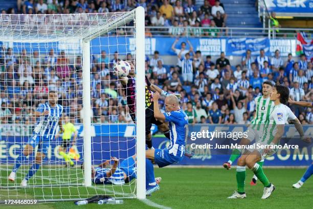 Hector Bellerin of Real Betis scores their sides own goal during the LaLiga EA Sports match between Deportivo Alaves and Real Betis at Estadio de...