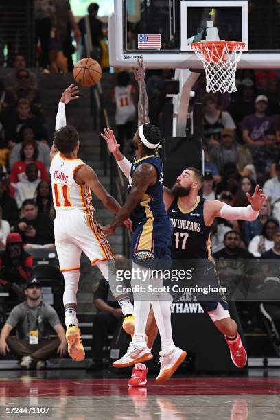 Trae Young of the Atlanta Hawks shoots the ball during the game against the New Orleans Pelicans on October 14, 2023 at Gateway Center Arena in...