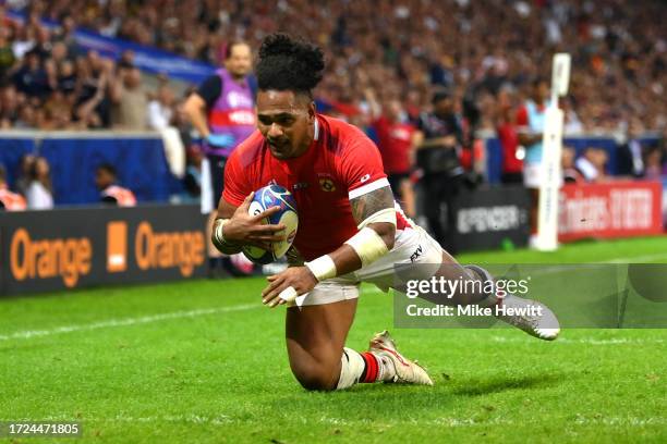 Solomone Kata of Tonga scores his team's sixth try during the Rugby World Cup France 2023 match between Tonga and Romania at Stade Pierre Mauroy on...