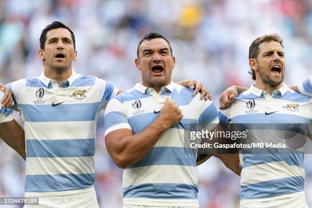 Matías Moroni, Agustín Creevy and Nicolás Sánchez of Argentina sing the national anthem prior to the Rugby World Cup France 2023 Quarter Final match...