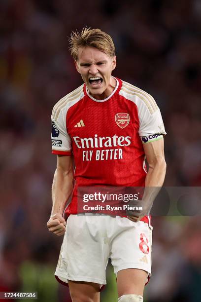 Martin Odegaard of Arsenal celebrates at full time following their sides victory in the Premier League match between Arsenal FC and Manchester City...