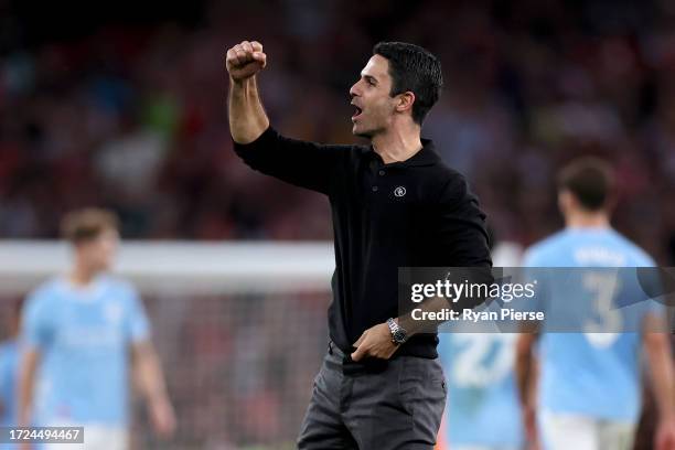 Mikel Arteta, Manager of Arsenal, celebrates following their sides victory after the Premier League match between Arsenal FC and Manchester City at...