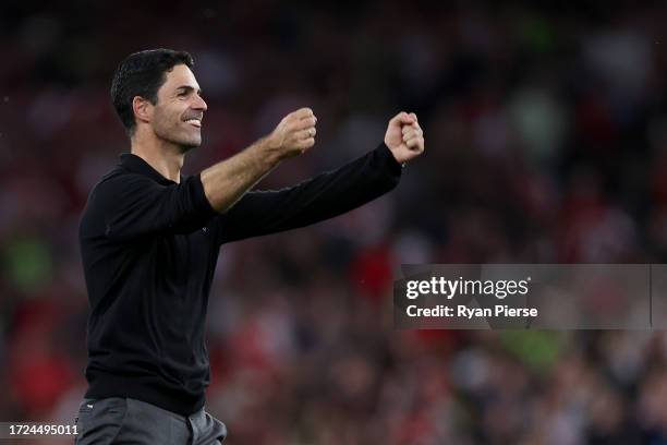 Mikel Arteta, Manager of Arsenal, celebrates following their sides victory after the Premier League match between Arsenal FC and Manchester City at...