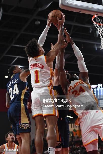 Jalen Johnson of the Atlanta Hawks grabs the rebound during the game against the New Orleans Pelicans on October 14, 2023 at Gateway Center Arena in...