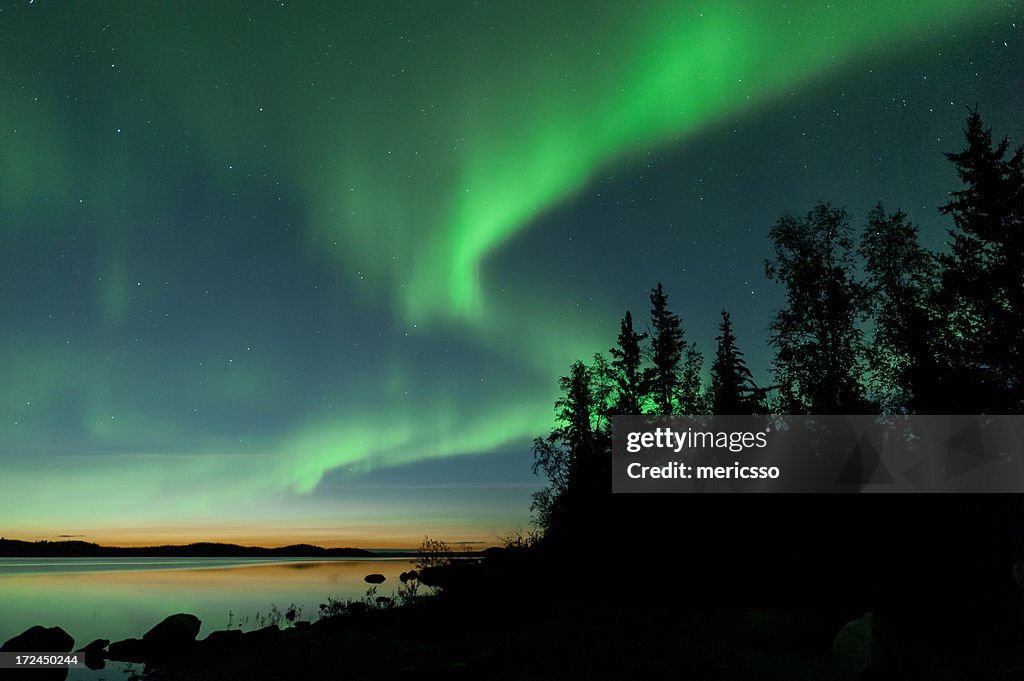 Summer aurora on lake