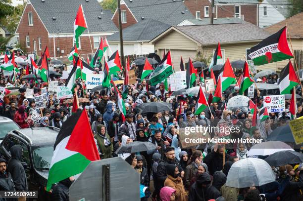 Residents of Detroit and the Arab Community of Dearborn march in support of Palestinians on October 14, 2023 in Dearborn, Michigan. Dearborn is home...