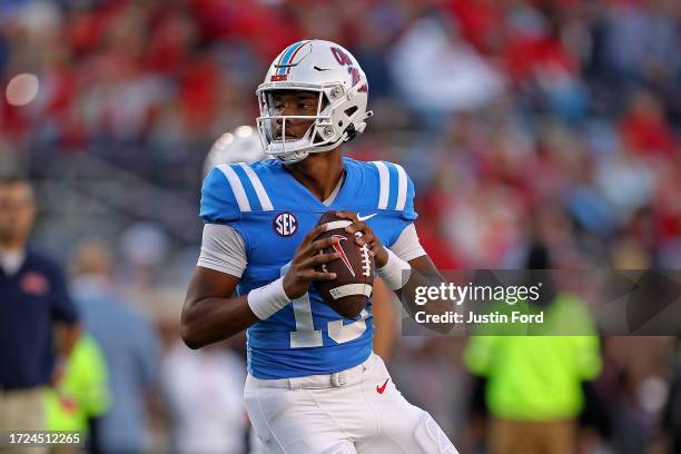 Austin Simmons of the Mississippi Rebels warms up before the game against the Arkansas Razorbacks at Vaught-Hemingway Stadium on October 07, 2023 in...