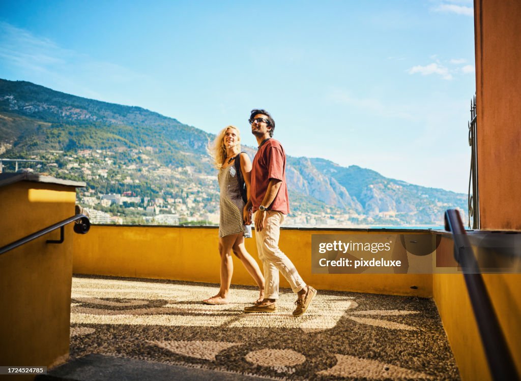 Young millennial couple enjoying their trip to Menton, while travelling in the south of France.