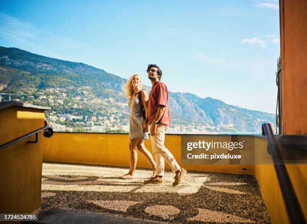 young millennial couple enjoying their trip to menton, while travelling in the south of france. - summer in the city stock pictures, royalty-free photos & images