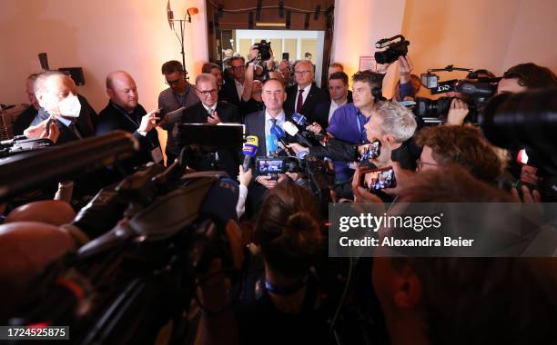 Hubert Aiwanger, lead candidate and leader of the Free Voters speaks to the media after reacting to initial results in Bavarian state elections...