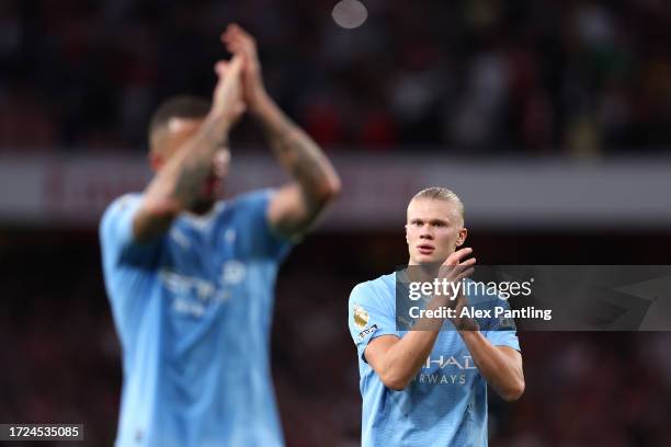 Erling Haaland of Manchester City applauds fans following defear during the Premier League match between Arsenal FC and Manchester City at Emirates...