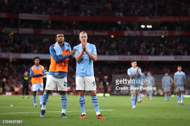 Manuel Akanji and Erling Haaland applaud fans following defeat during the Premier League match between Arsenal FC and Manchester City at Emirates...