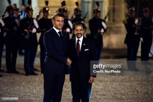 French President Emmanuel Macron welcomes the Sultan of Brunei, His Majesty Haji Hassanal Bolkiah Mu izzaddin Waddaulah, at the Elysee Palace. In...