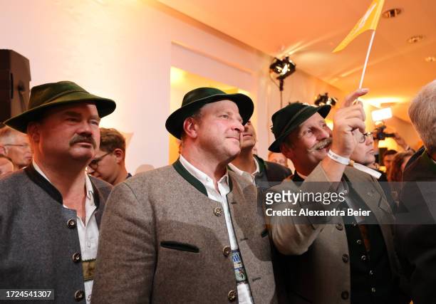 Supporters of the Free Voters2 react to initial results in Bavarian state elections following the closing of polling stations on October 8, 2023 in...