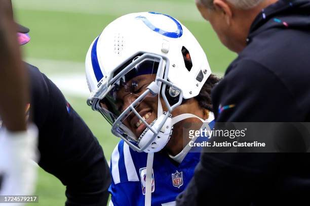 Anthony Richardson of the Indianapolis Colts reacts after an injury during the play against the Tennessee Titans during the second quarter at Lucas...