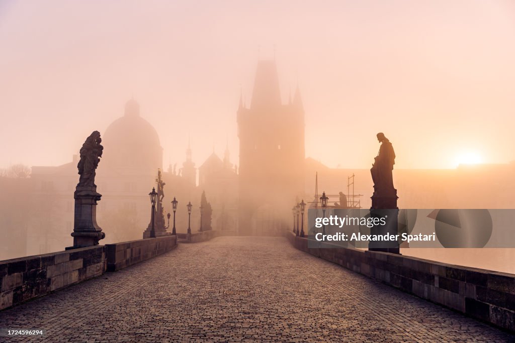 Charles Bridge on a foggy autumn morning, Prague, Czech Republic