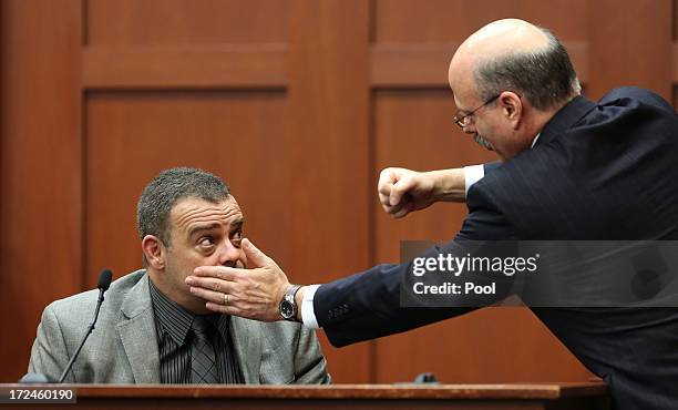 Prosecutor Bernie de la Rionda demonstrates a possible scenario while questioning state witness Chris Serino, a Sanford police officer, during the...