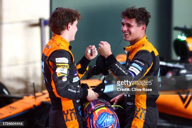 Second placed Oscar Piastri of Australia and McLaren and Third placed Lando Norris of Great Britain and McLaren celebrate in parc ferme during the F1...