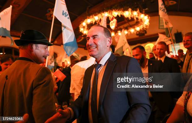 Hubert Aiwanger, lead candidate and leader of the Free Voters arrives at the Free Voters election party after initial results in Bavarian state...
