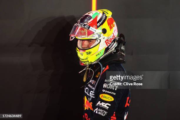 10th placed Sergio Perez of Mexico and Oracle Red Bull Racing walks in parc ferme during the F1 Grand Prix of Qatar at Lusail International Circuit...