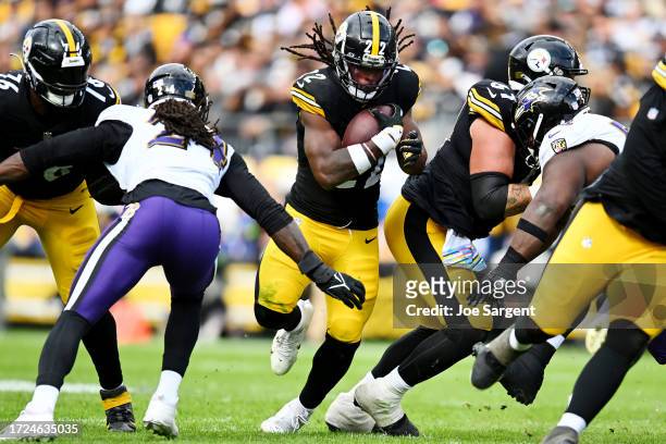 Najee Harris of the Pittsburgh Steelers runs the ball during the fourth quarter against the Baltimore Ravens at Acrisure Stadium on October 08, 2023...