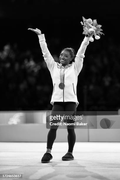 Gold Medalist Simone Biles of USA poses for photographs on the podium for the Women's Floor Final during Day Nine of the 2023 Artistic Gymnastics...