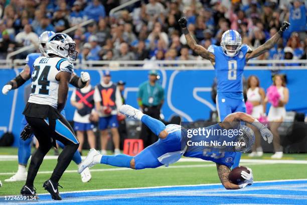 Craig Reynolds of the Detroit Lions scores a touchdown during the fourth quarter against the Houston Texans at Ford Field on October 08, 2023 in...