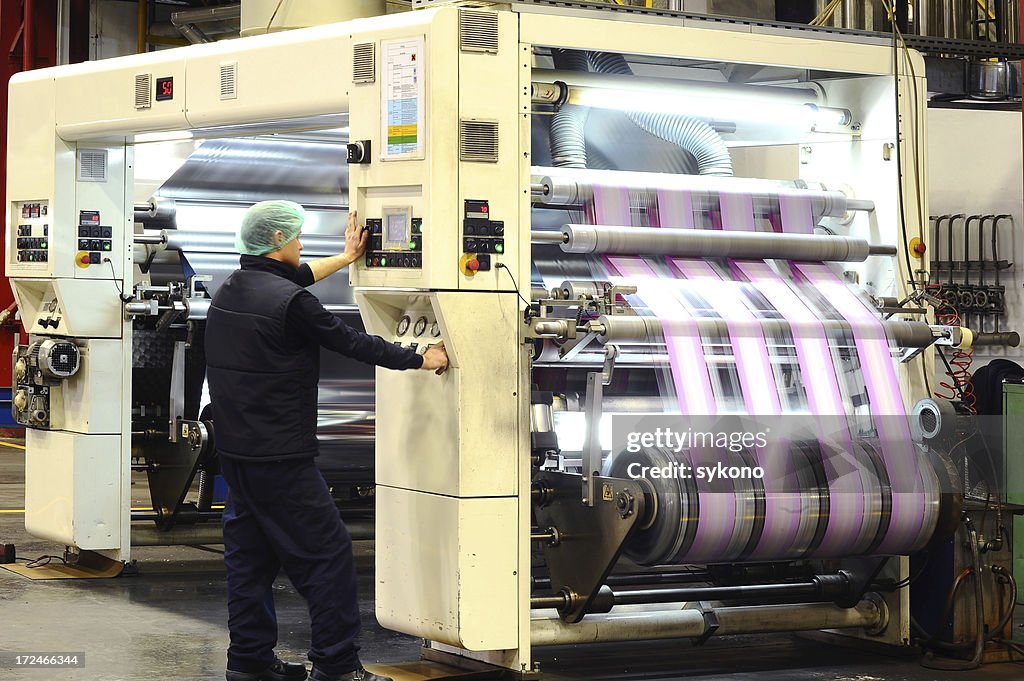 Printing press and worker