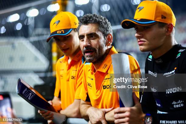 Second placed Oscar Piastri of Australia and McLaren and Third placed Lando Norris of Great Britain and McLaren celebrate with their team after the...