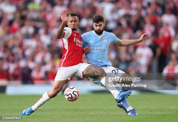 Gabriel Jesus of Arsenal clashes with Josko Gvardiol of Manchester City during the Premier League match between Arsenal FC and Manchester City at...