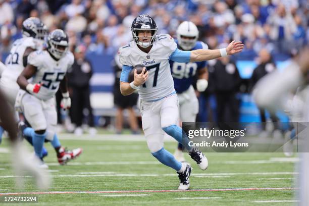 Ryan Tannehill of the Tennessee Titans runs with the ball during a game against the Indianapolis Colts at Lucas Oil Stadium on October 08, 2023 in...